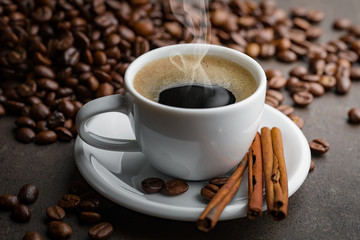 Black coffee on an old background in a cup