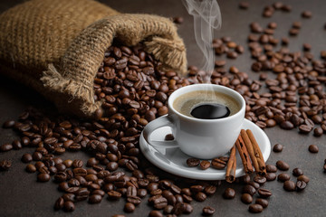 Black coffee on an old background in a cup