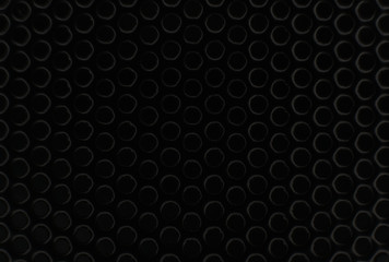Abstract black background with many circles.
