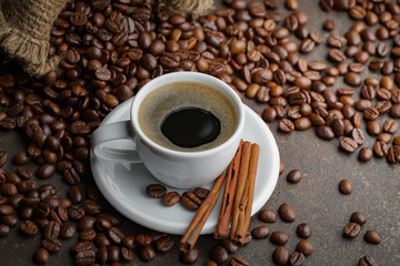 Black coffee on an old background in a cup