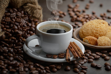 Black coffee on an old background in a cup