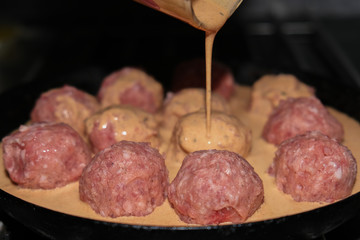 Semifinished. Frozen Meatballs. Preparation for cooking. Selective focus.