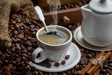 Black coffee on an old background in a cup