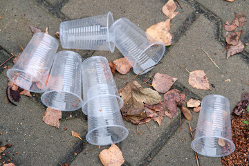 disposable plastic cups on the street
