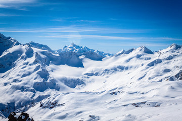 Fototapeta na wymiar Winter panoramic view of the snowy high mountains of Elbrus in the Russia