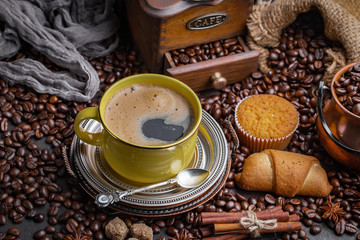 Black coffee on an old background in a cup