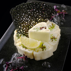 .sweet roll on a black background