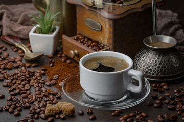 Black coffee on an old background in a cup
