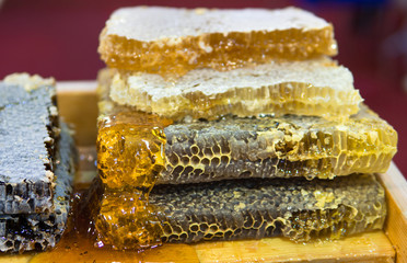 natural organic honeycomb sold placed side by side.