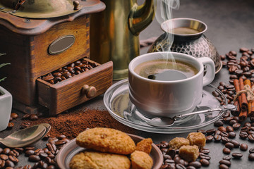 Black coffee on an old background in a cup