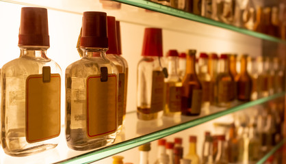 small bottles of grappa on the shelf