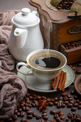 Black coffee on an old background in a cup