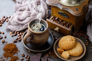 Black coffee on an old background in a cup