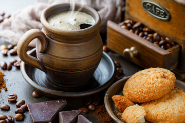 Black coffee on an old background in a cup