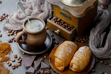 Black coffee on an old background in a cup