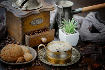 Black coffee on an old background in a cup