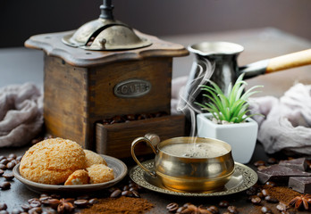 Black coffee on an old background in a cup