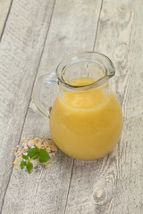 Dietary vegetarian oats milk over wooden