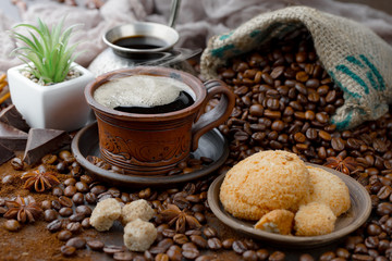 Black coffee on an old background in a cup