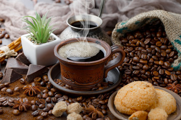 Black coffee on an old background in a cup