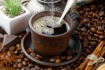 Black coffee on an old background in a cup