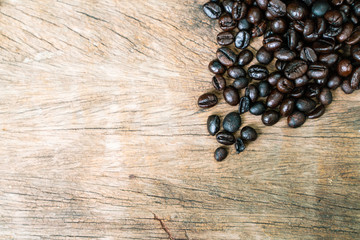 Coffee bean roasted on wooden background