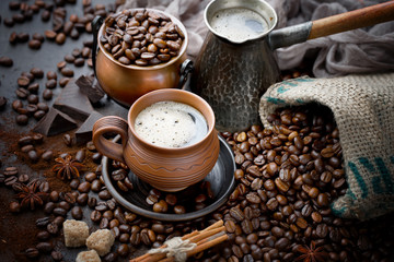 Black coffee on an old background in a cup