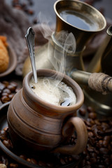 Black coffee on an old background in a cup