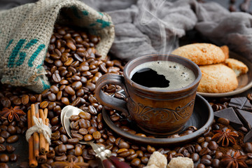 Black coffee on an old background in a cup