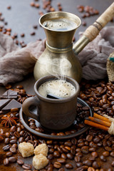 Black coffee on an old background in a cup