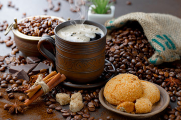 Black coffee on an old background in a cup