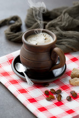 Black coffee on an old background in a cup