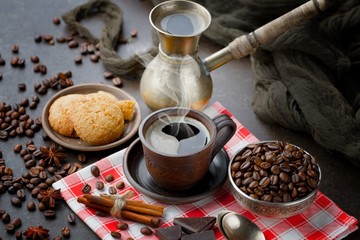 Black coffee on an old background in a cup