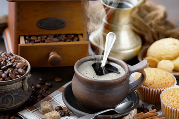 Black coffee on an old background in a cup