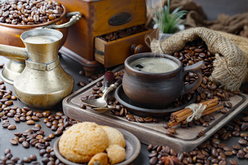 Black coffee on an old background in a cup