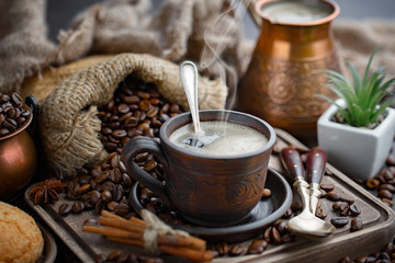 Black coffee on an old background in a cup