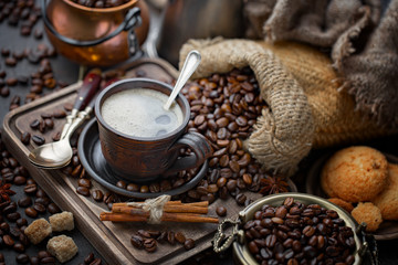 Black coffee on an old background in a cup