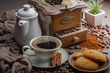Black coffee on an old background in a cup