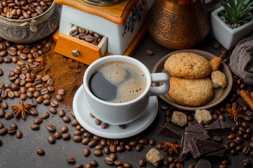 Black coffee on an old background in a cup