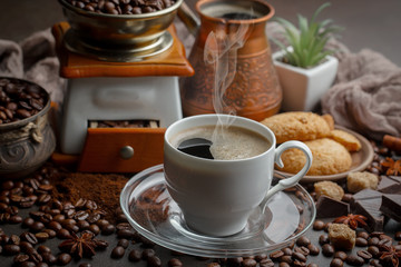 Black coffee on an old background in a cup