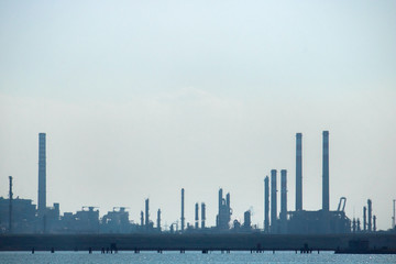 Gas and oil refinery with copy space, industrial scene near Venice (Italy)