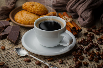 Black coffee on an old background in a cup