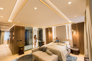 Relaxed young lovers in the luxurious apartment in the night