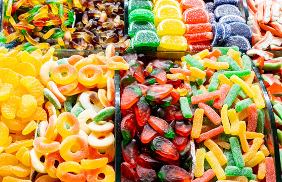 Assorted colorful different shape jelly candies on the market