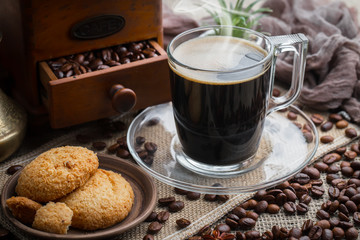 Black coffee on an old background in a cup