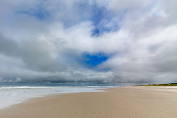 Clouds over the beach on Juist, East Frisian Islands, Germany.