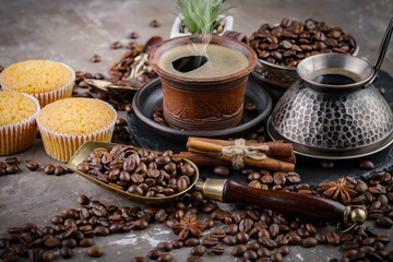 Black coffee on an old background in a cup