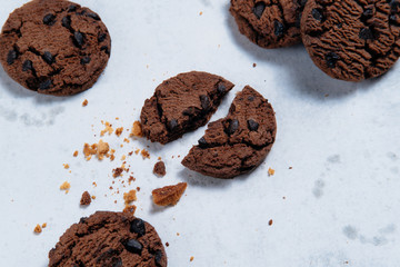 tasty chocolate chip cookies on white background.