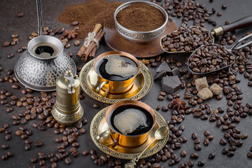 Black coffee on an old background in a cup