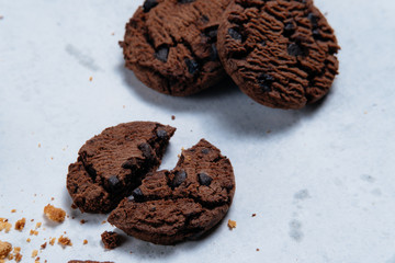 tasty chocolate chip cookies on white background.